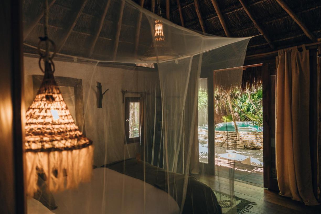 Ikal Tulum Hotel Bagian luar foto Interior of a bungalow